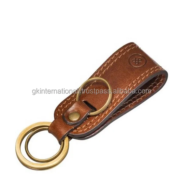 Full Double Stitched Tan leather key chain for cars almirah bikes with one main and two small metal rings at wholesale price