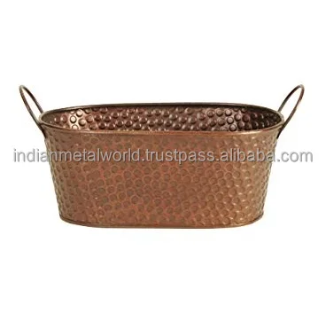 Black powder coated iron planter suppliers and exporters of modern metal planters and flower buckets at low price