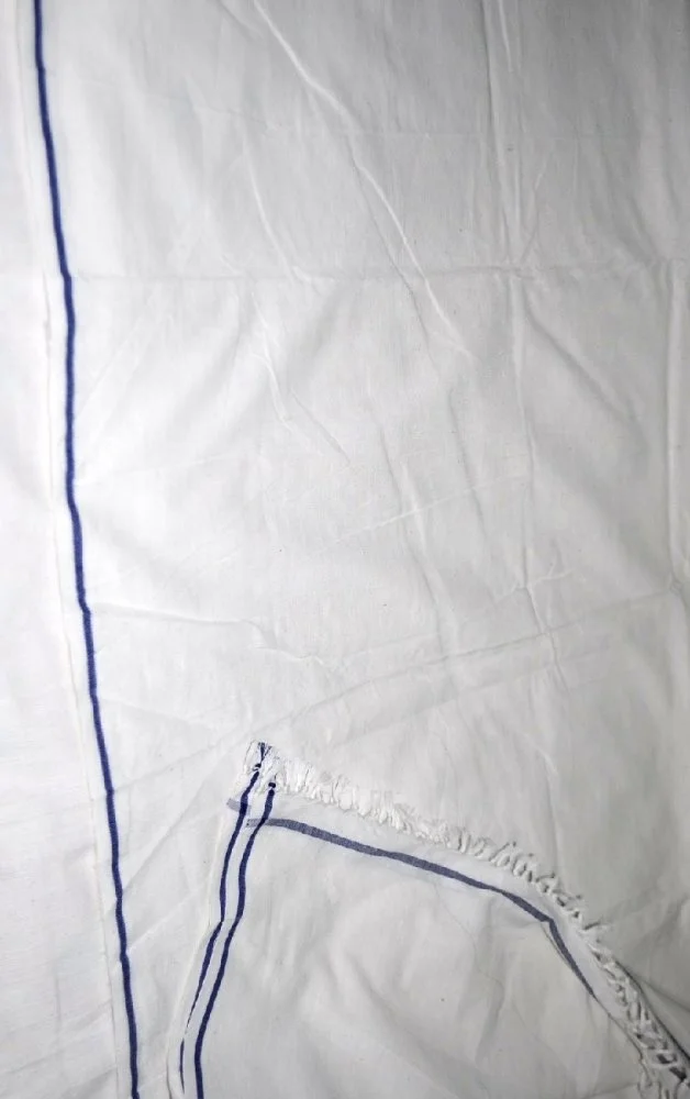 Hand woven white table cloth