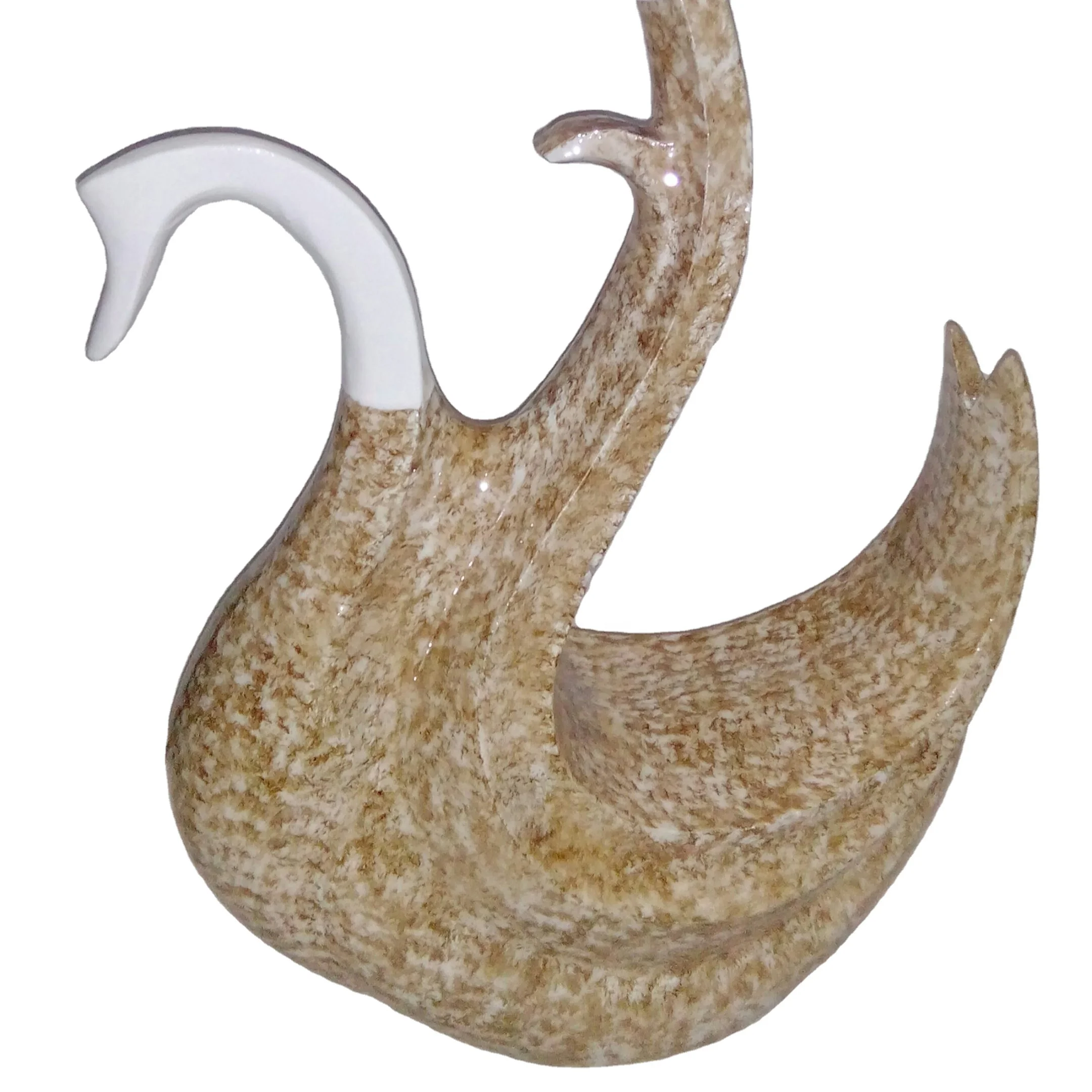 Metal decorative swan in white and golden color .