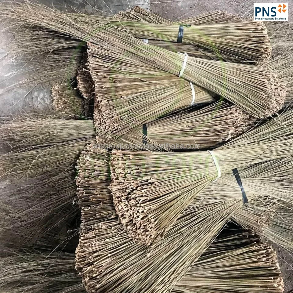 ecofriendly palm leaf broom stick long handle sweeper for gardens patios and outdoor spaces origin North Sumatra Indonesia