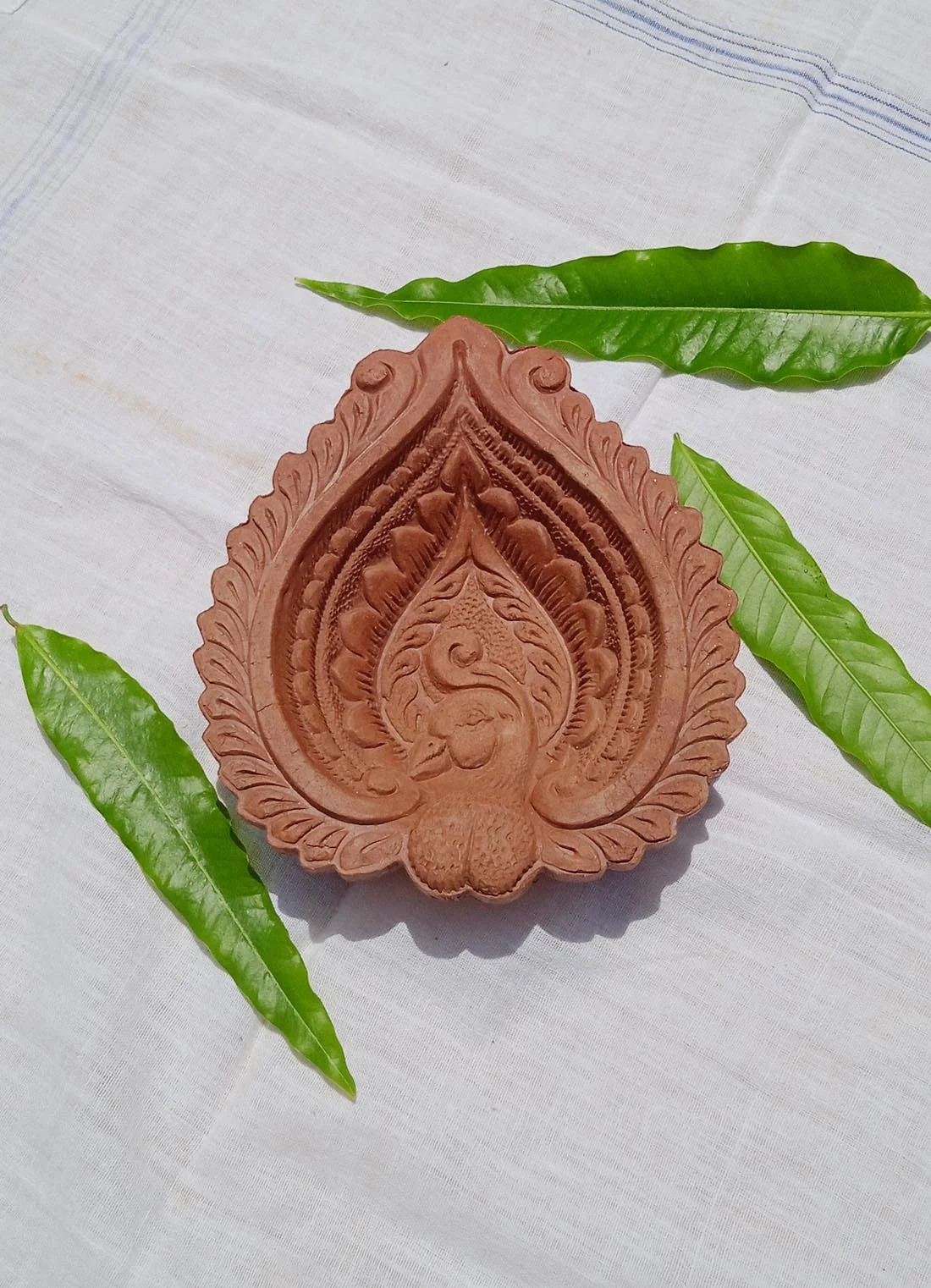 Natural clay terracotta Handmade peacock designed red clay diwali diyas oil lamps for diwali festival and rituals