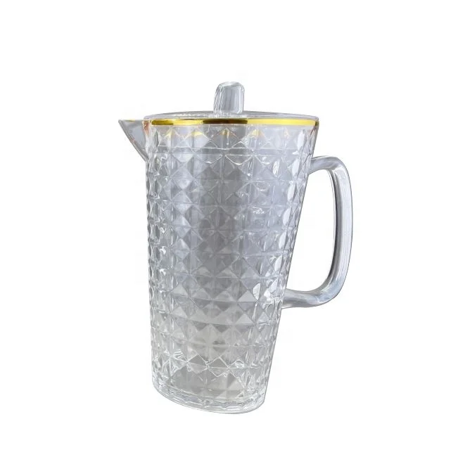 Gold rimmed acrylic plastic water pitcher