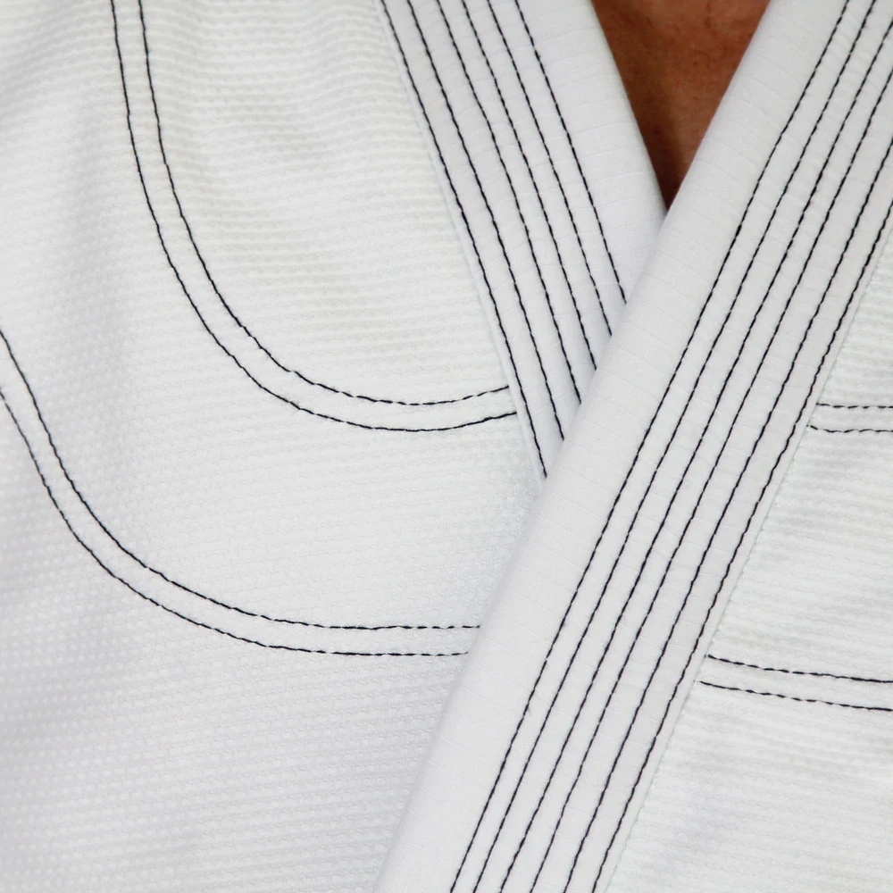 Latest Design Jiu Jitsu Uniform Made In 100% Cotton White color Adult Bjj Gi With Customized Patch Logo