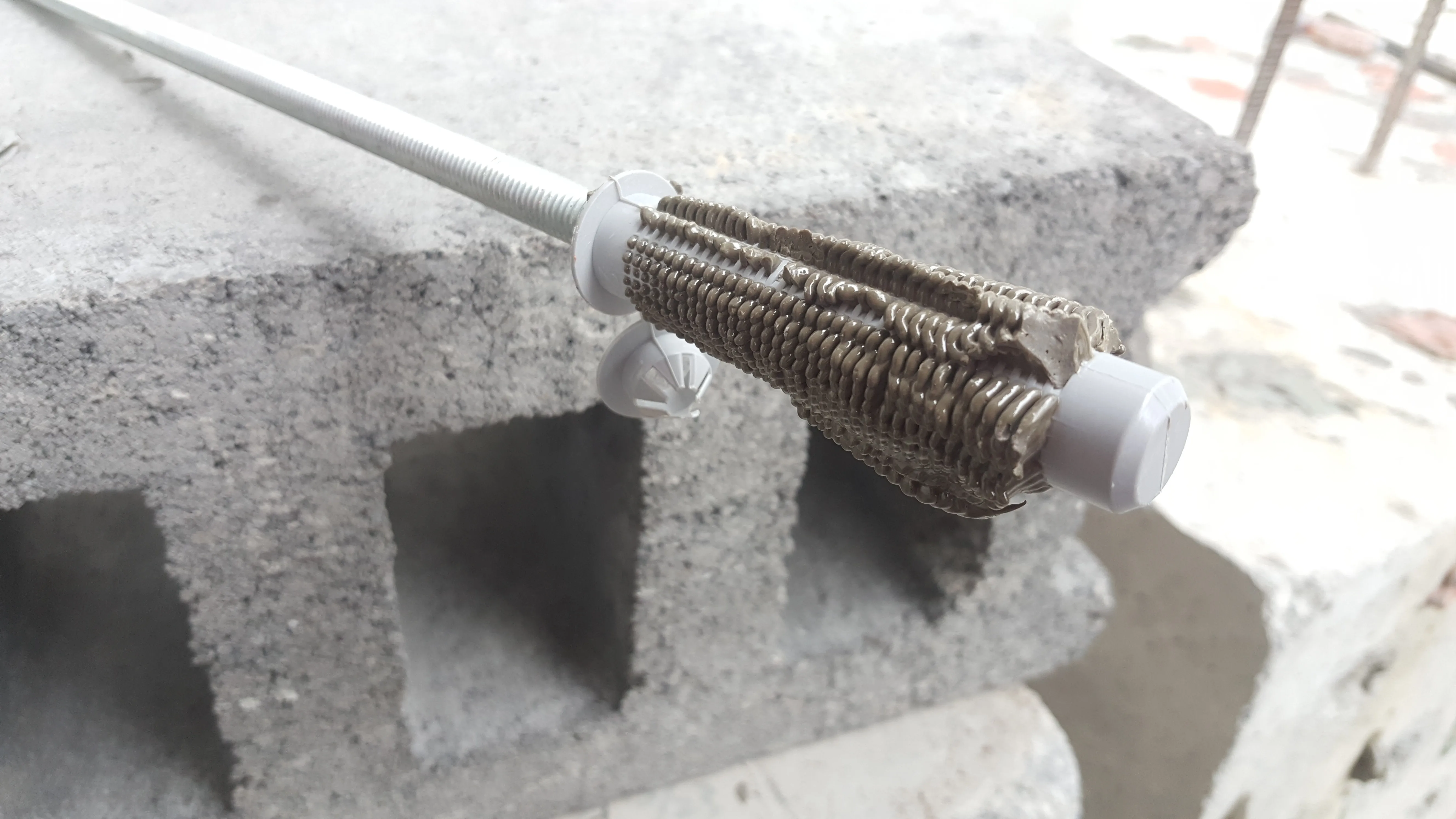 Plastic sleeve anchor for chemical anchor installation