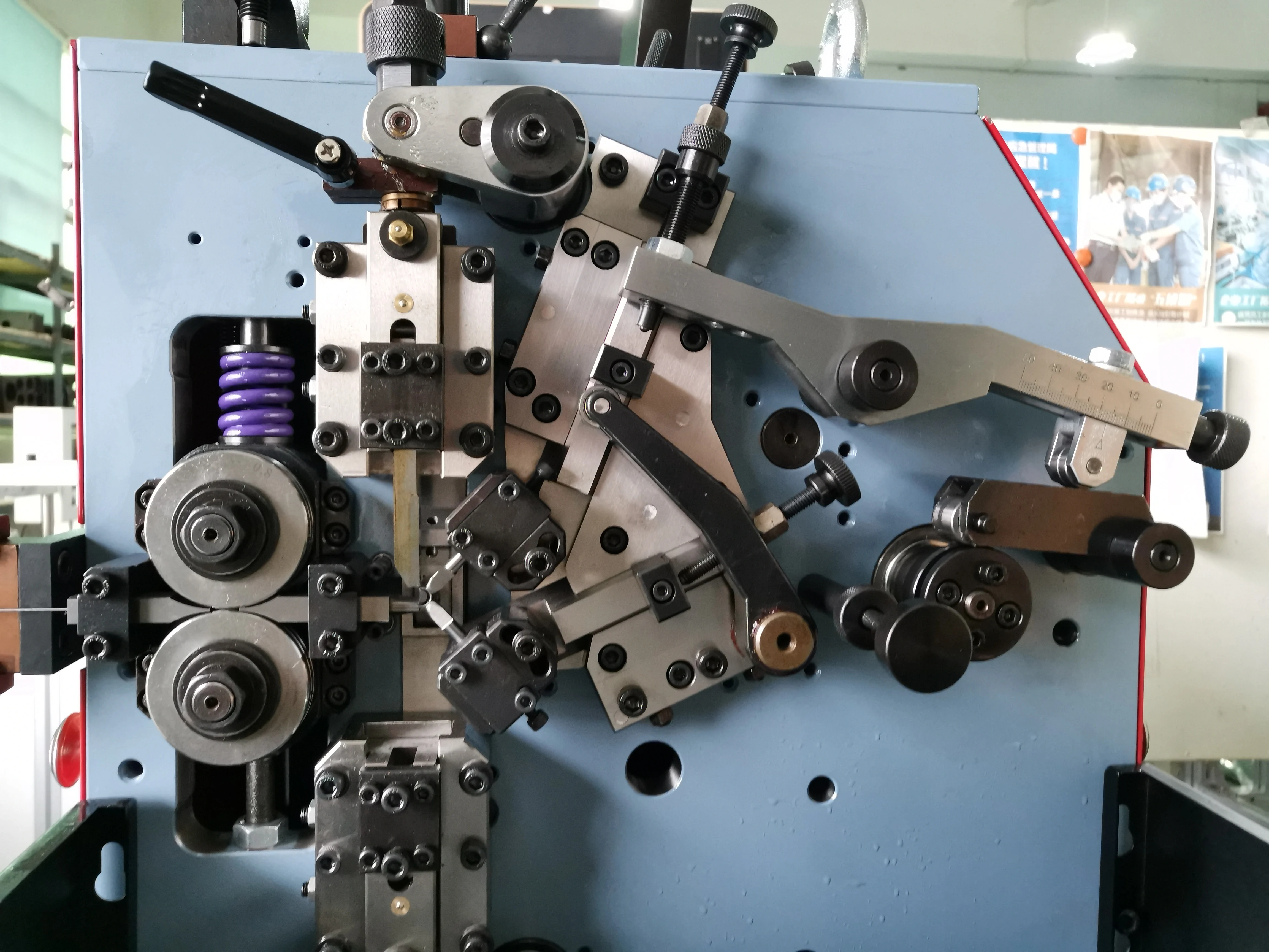 2D SPRING MAKING for Bobbin Case latch spring 2 AXIS CNC MACHINES SC-208