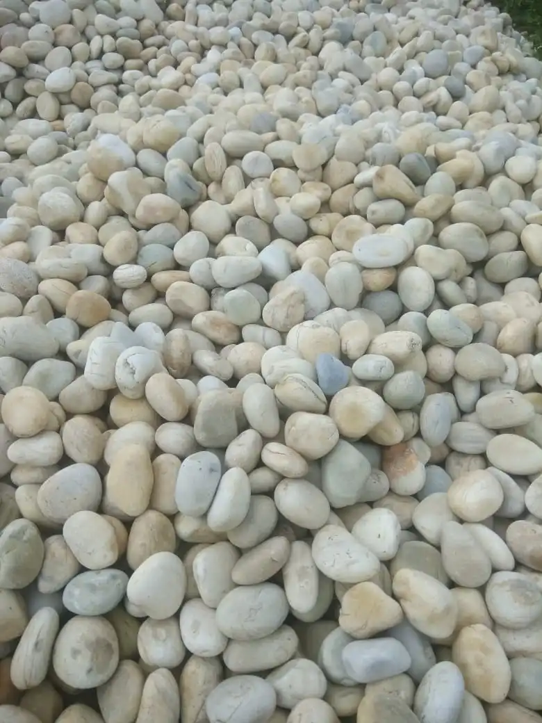 river cobbles and pebbles white tumble and rough rock stone for garden and exterior landscaping decoration used