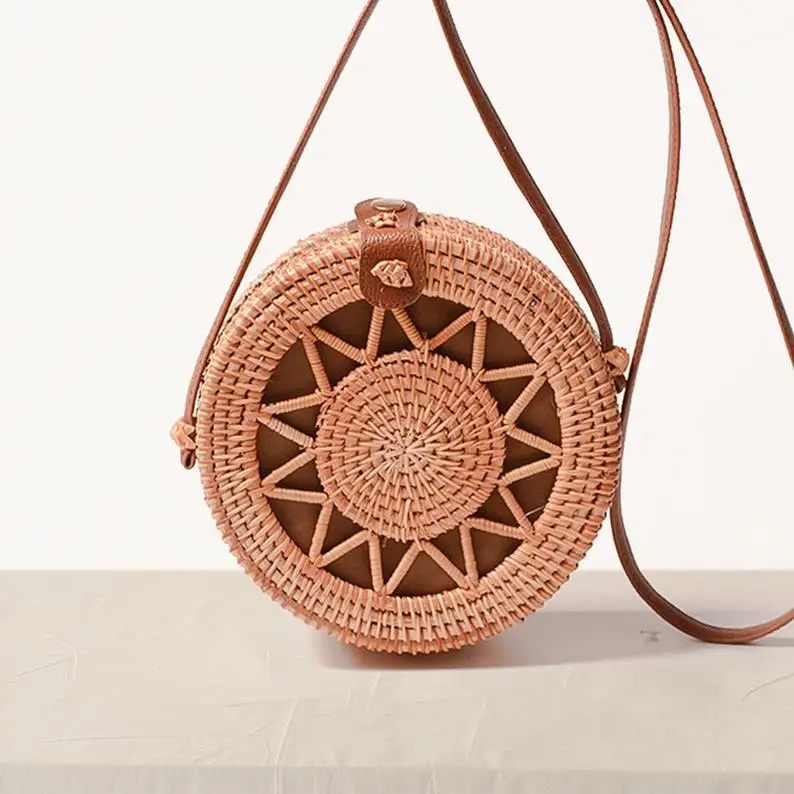 
ECO - FRIENDLY round handmade rattan bag Shoulder Leather Straps Fabric inside Natural Fashionable woven Rattan Bags 