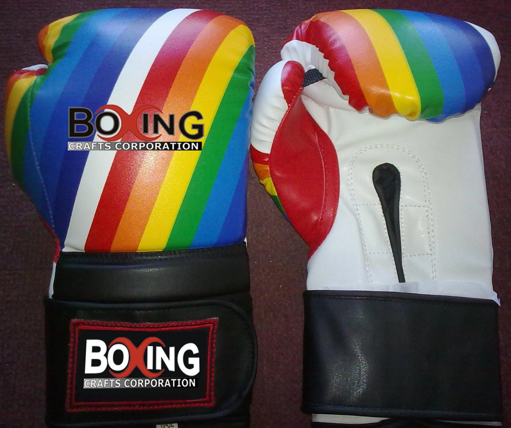 
wellknown whole sale manufacturer of leather made tikando jujitsu karate muay thai boxing gloves with customized logo & design 