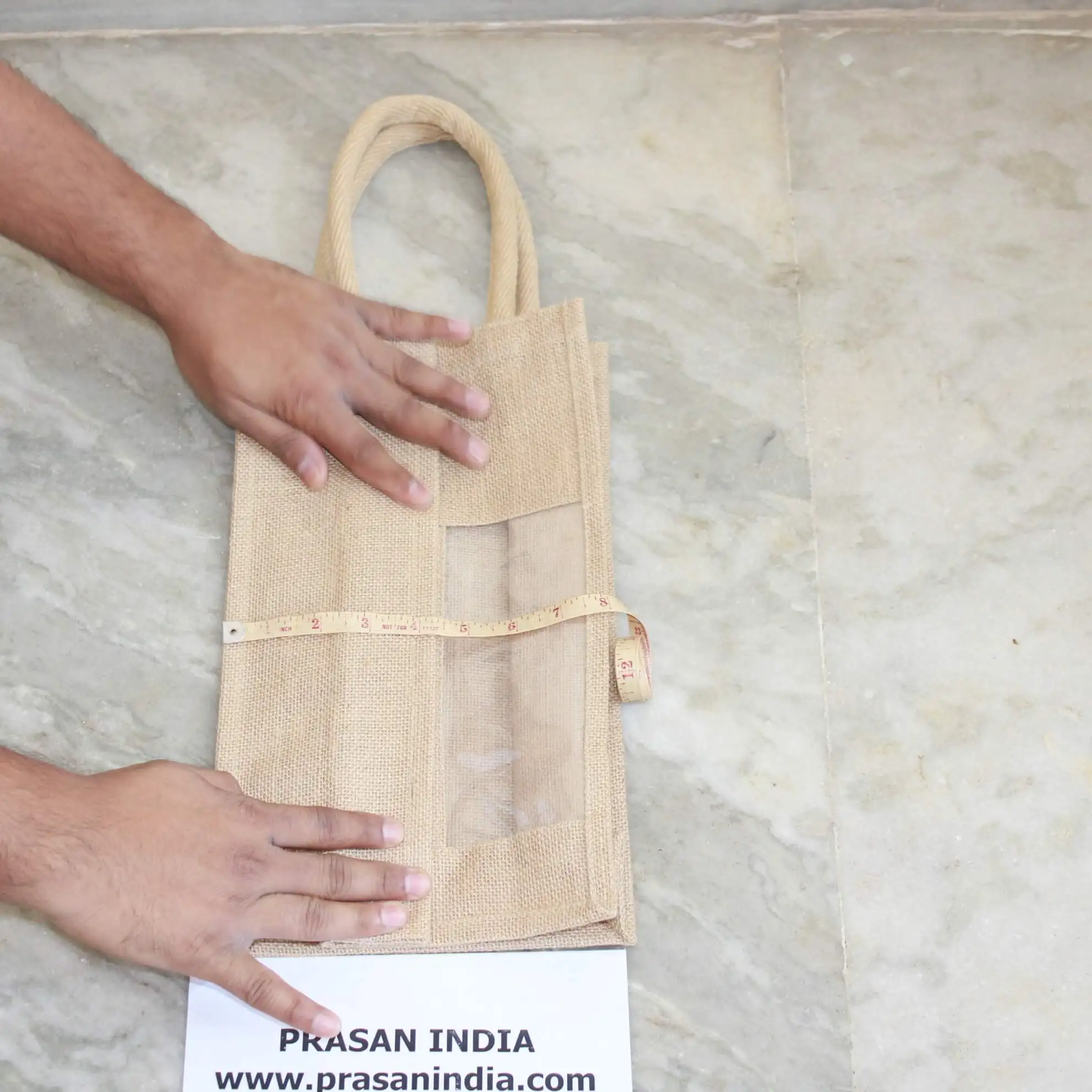 Two Bottle Wine Bag with front Transparent window main material used to construct the bag is JUTE