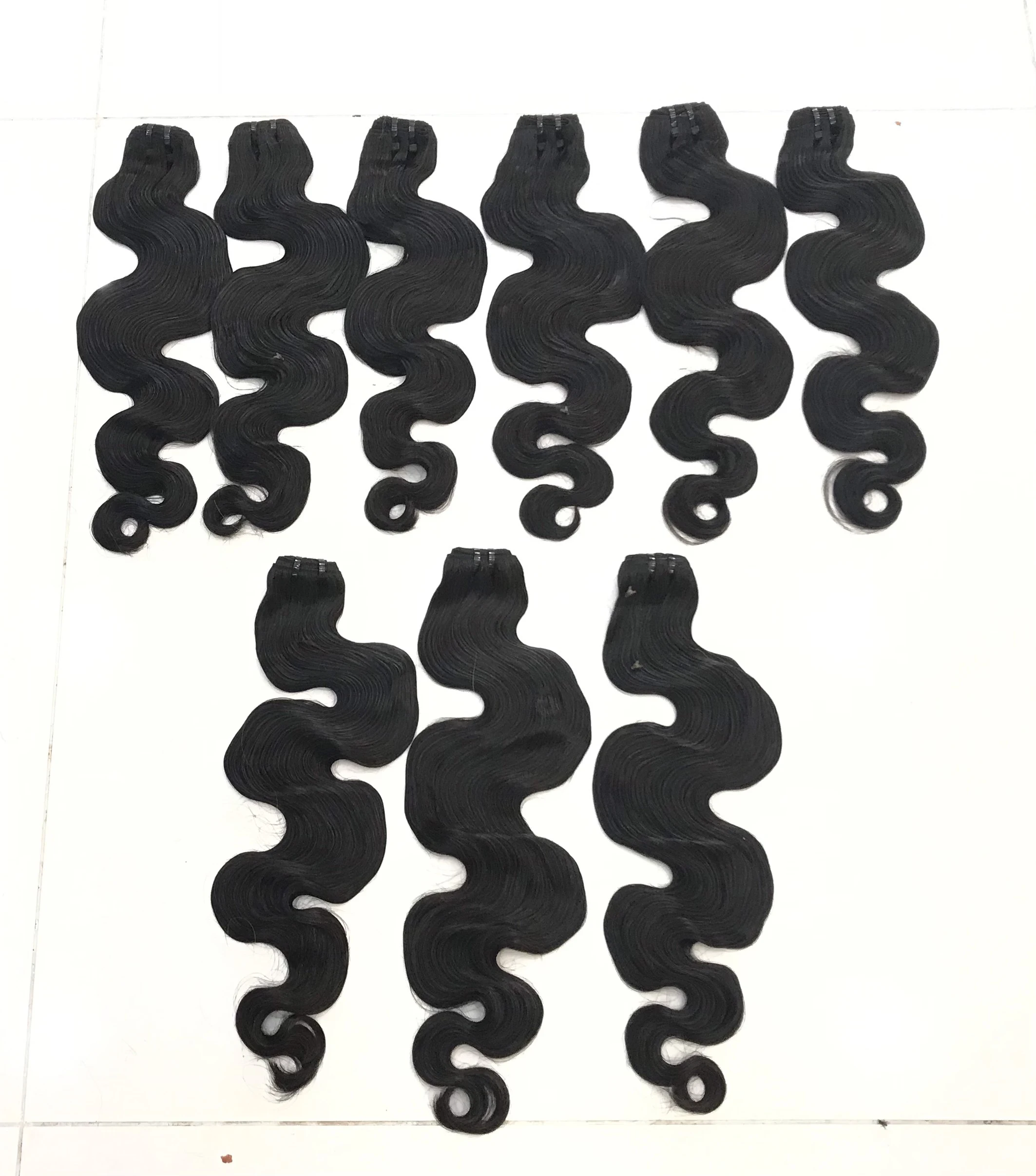 2021 New Model 5 Oct 100% Raw Vietnamese Virgin Remy Hair Extensions High Quality Wavy Style Smooth Body Wavy Wholesale Price