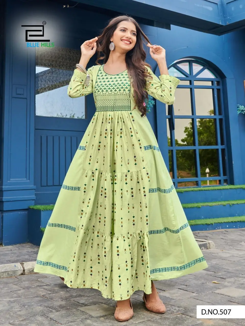Desirable Elementry Cream colour  Long Gown with Frill Concept and heavy Embroidery work  in heavy Cotton Camric of Royal Export