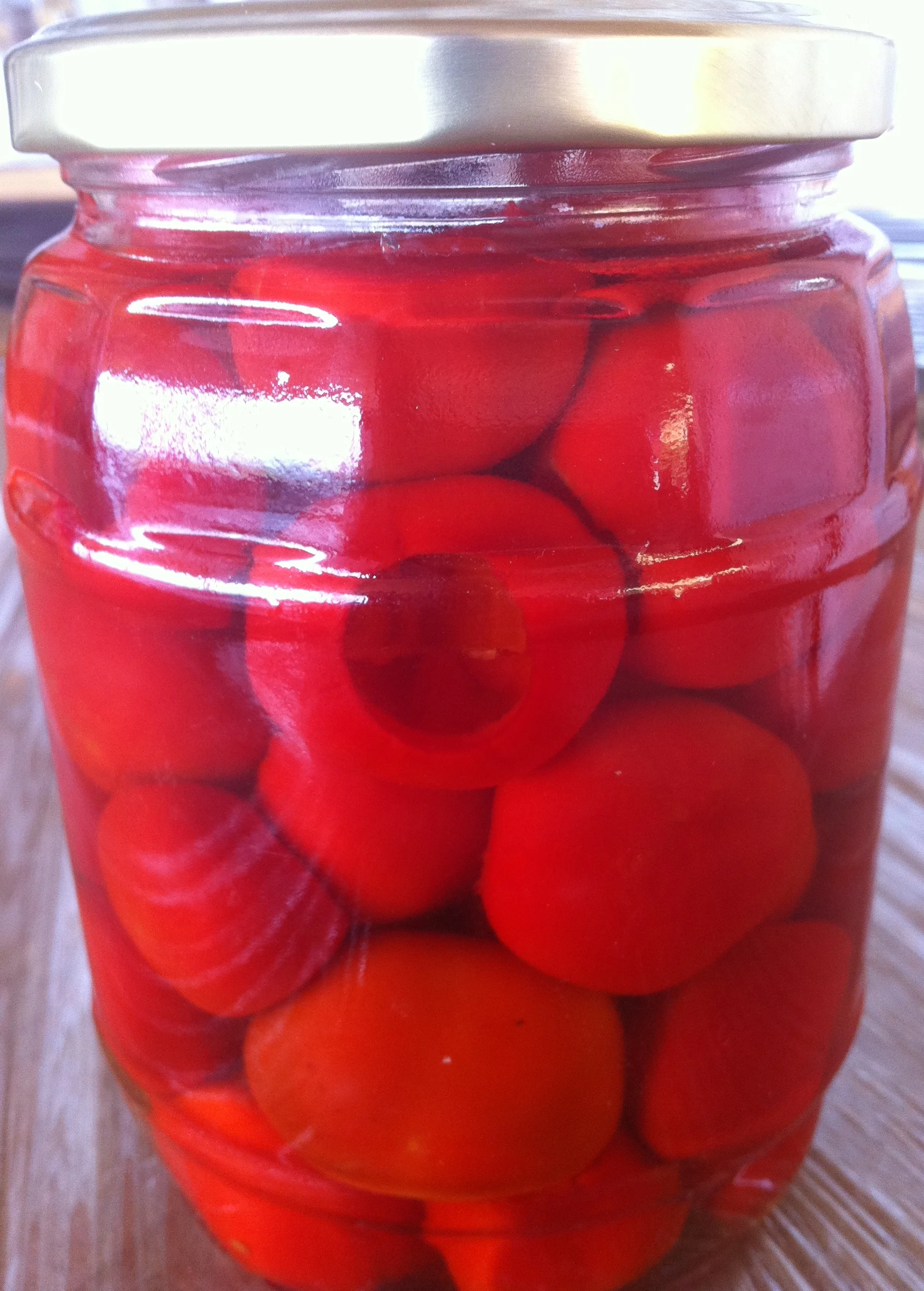 Cored Red Cherry Peppers in Sugar Syrup