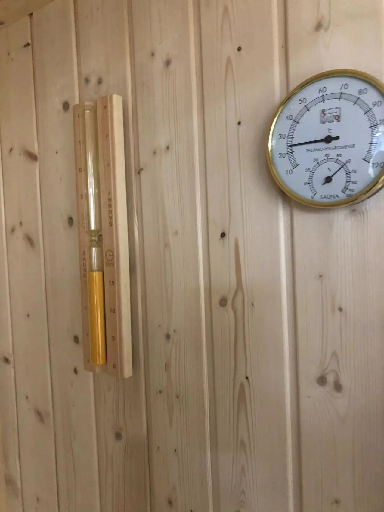 white spruce stone stove sauna room