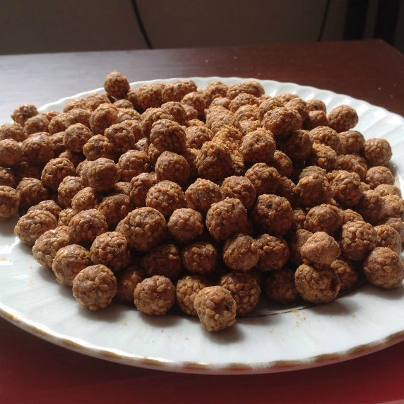 
roasted chickpeas coated with mesir paste 