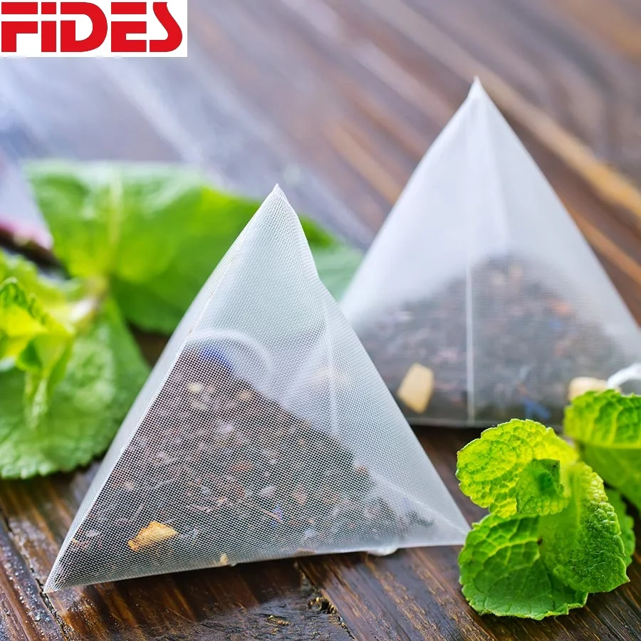 Organic 100% natural OEM Biodegradable NYLON PYRAMID TEA BAG with thread and tag for long leaf tea from India