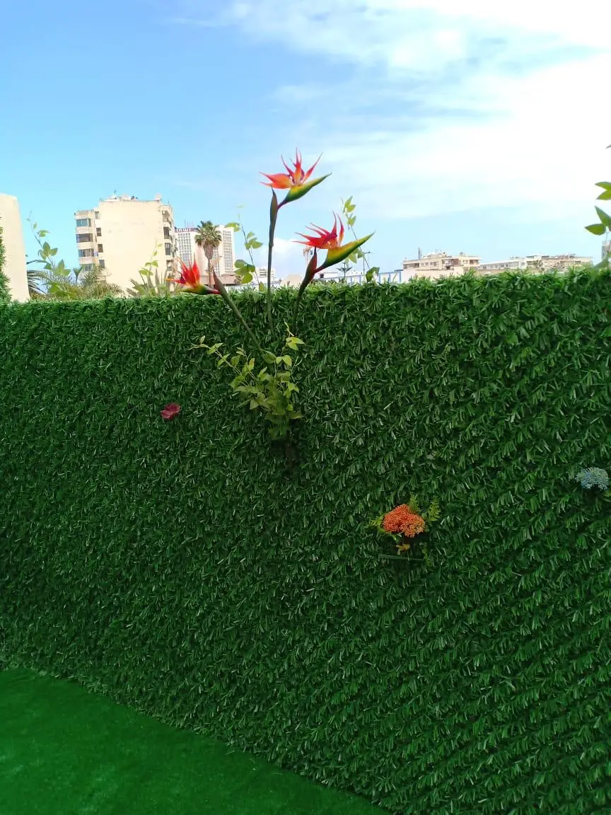 Red colour grass fence panels for gardens made from high quality pvc anti UV made in Turkey in different sizes and heights