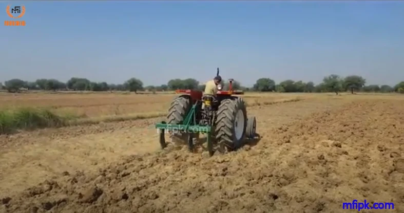 MF Tractor With 5 Tine Chisel Plough