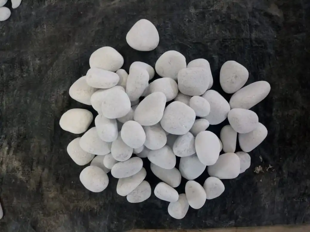 standard grade supper white rough stone marble pebbles tumble stone rocks pavers stepping stone wholesale in IND