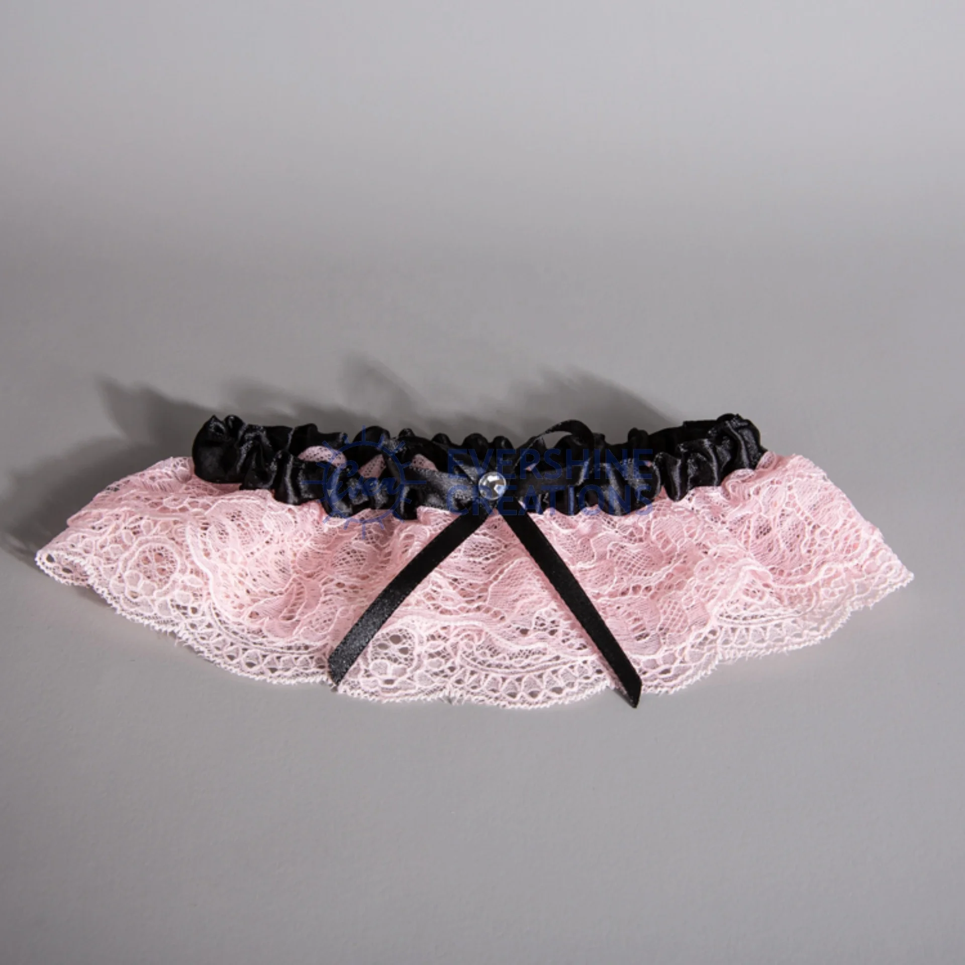 
HEN PARTY BRIDAL ACCESSORY POLYESTER GARTER SET - 2 PACK PINK LACE AND BLACK BOW 