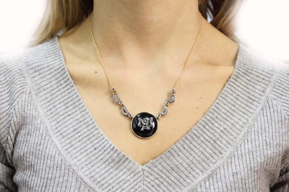 
Diamonds,Blue Sapphires,Onyx Rose Gold and Silver Pendant Necklace 
