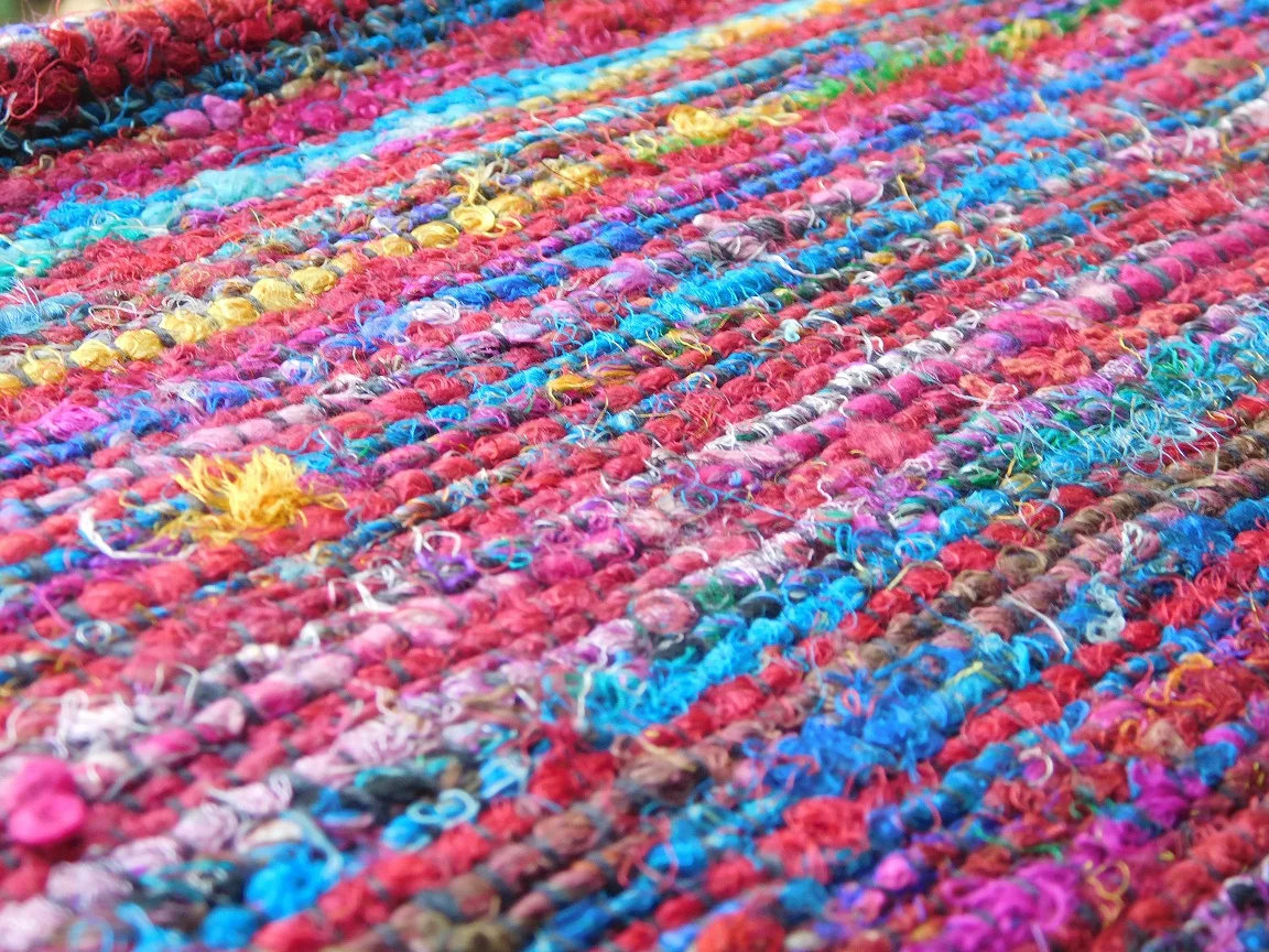 custom made multi colored recycled sari silk fabrics made from twisted sari yarns ideal for home textile stores