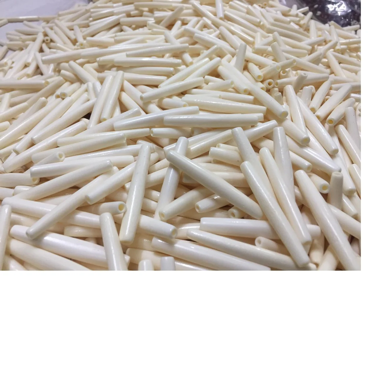 white bone tube beads and white pipe bone beads in assorted sizes for bead stores and jewelry designers