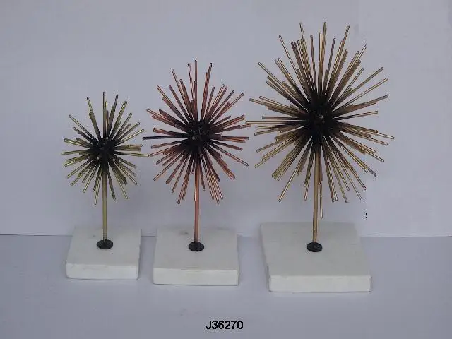 
Iron starburst sculpture in two tone with Marble stand 
