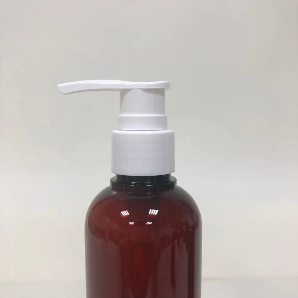 amber plastic PETG round bottle with white pump