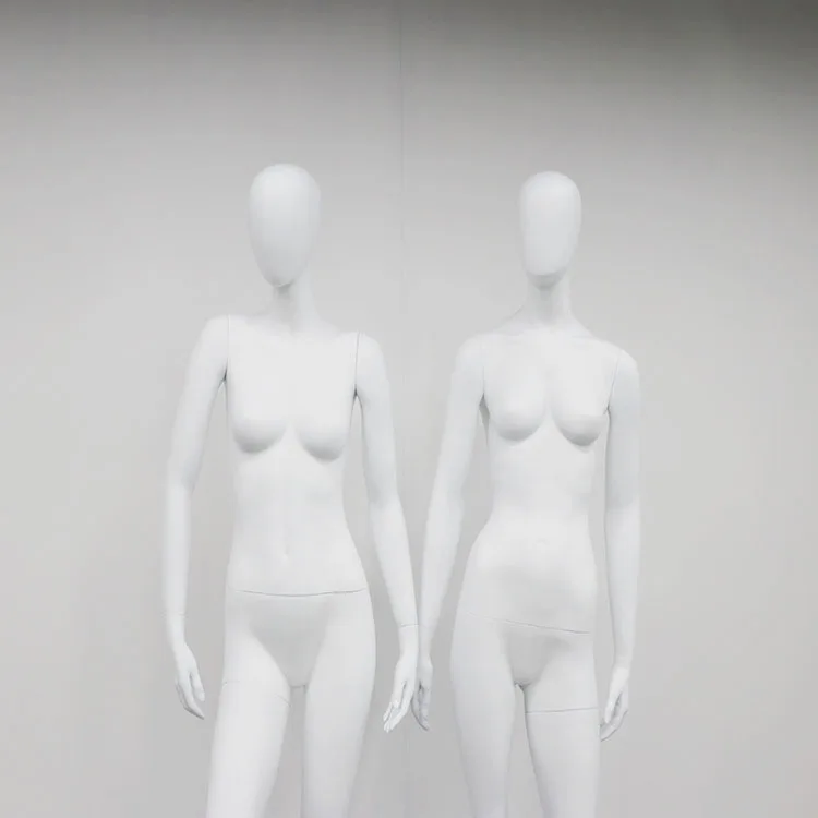 Abstract female full body white matte FRP manikin with egg head