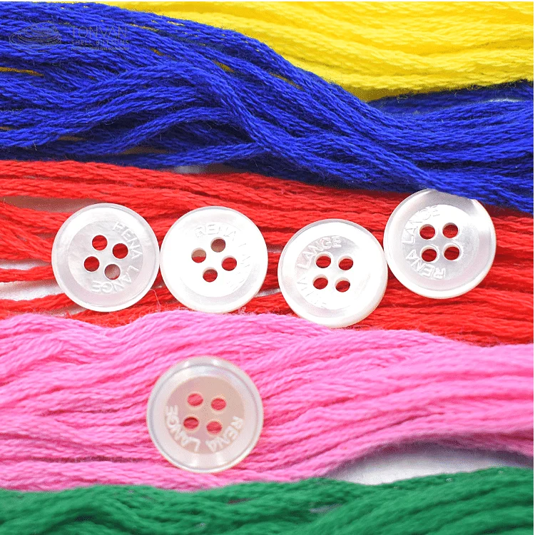 
Kinds of best 4 holes TonVan printing round button Natural shell in Vietnam with best price 