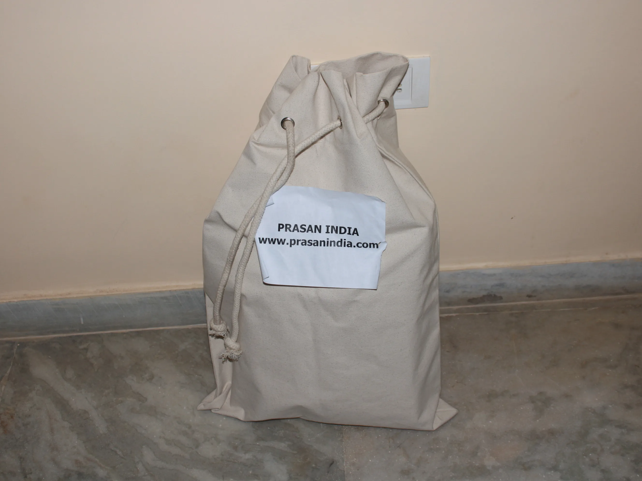 Santa sack cream drawstring pouch made of Indian canvas