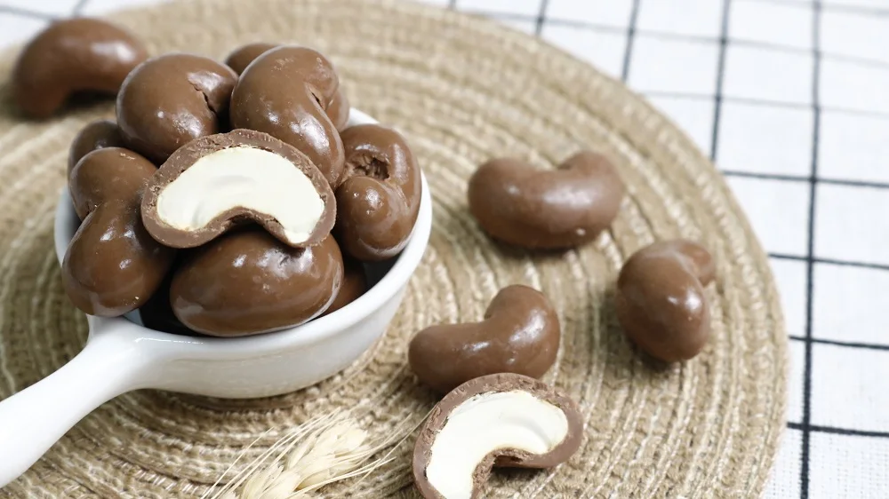 Milka chocolate sweets filled dried cashews for wholesale by Legendary Viet Nam chocolate bulk export