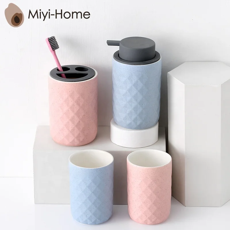 Classics Pink series 4-Piece Bath and Vanity Luxury Bathroom Essentials Accessory Set with Toothbrush Holder