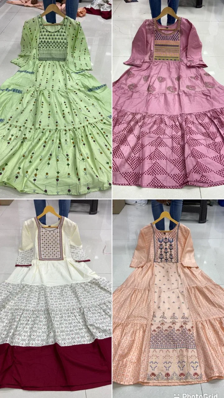 Desirable Elementry Cream colour  Long Gown with Frill Concept and heavy Embroidery work  in heavy Cotton Camric of Royal Export