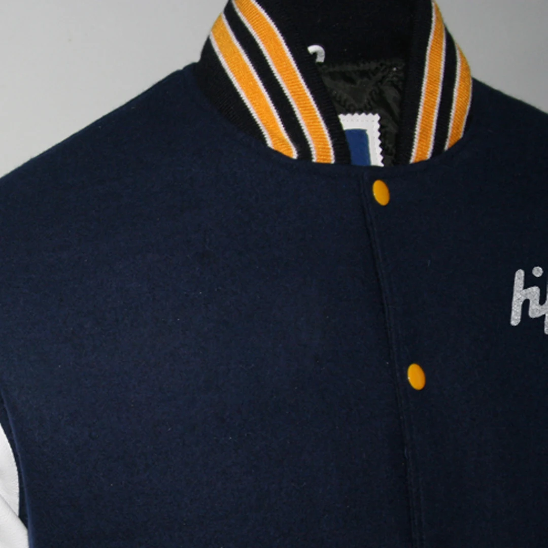 Custom New black And white Genuine Leather Sleeves In Top Grain White Varsity Jackets By Huzaifa Products