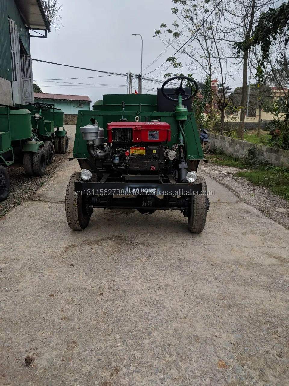 Product newest 2021 self loading concrete mixer 1500Liter driving two moving axles origin from Vietnam diesel engine 30HP 35HP