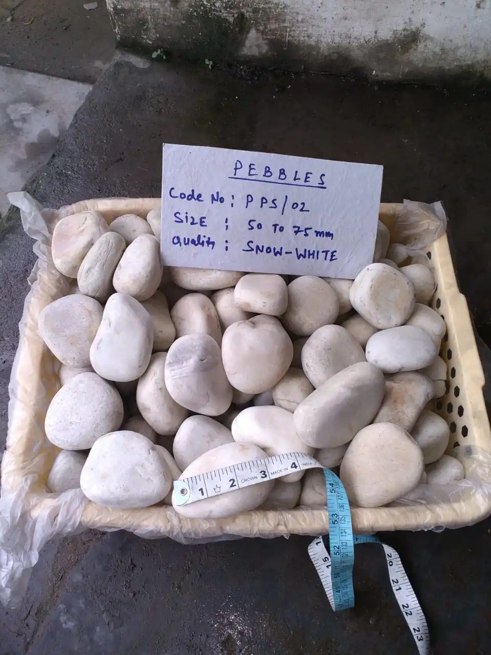 river cobbles and pebbles white tumble and rough rock stone for garden and exterior landscaping decoration used