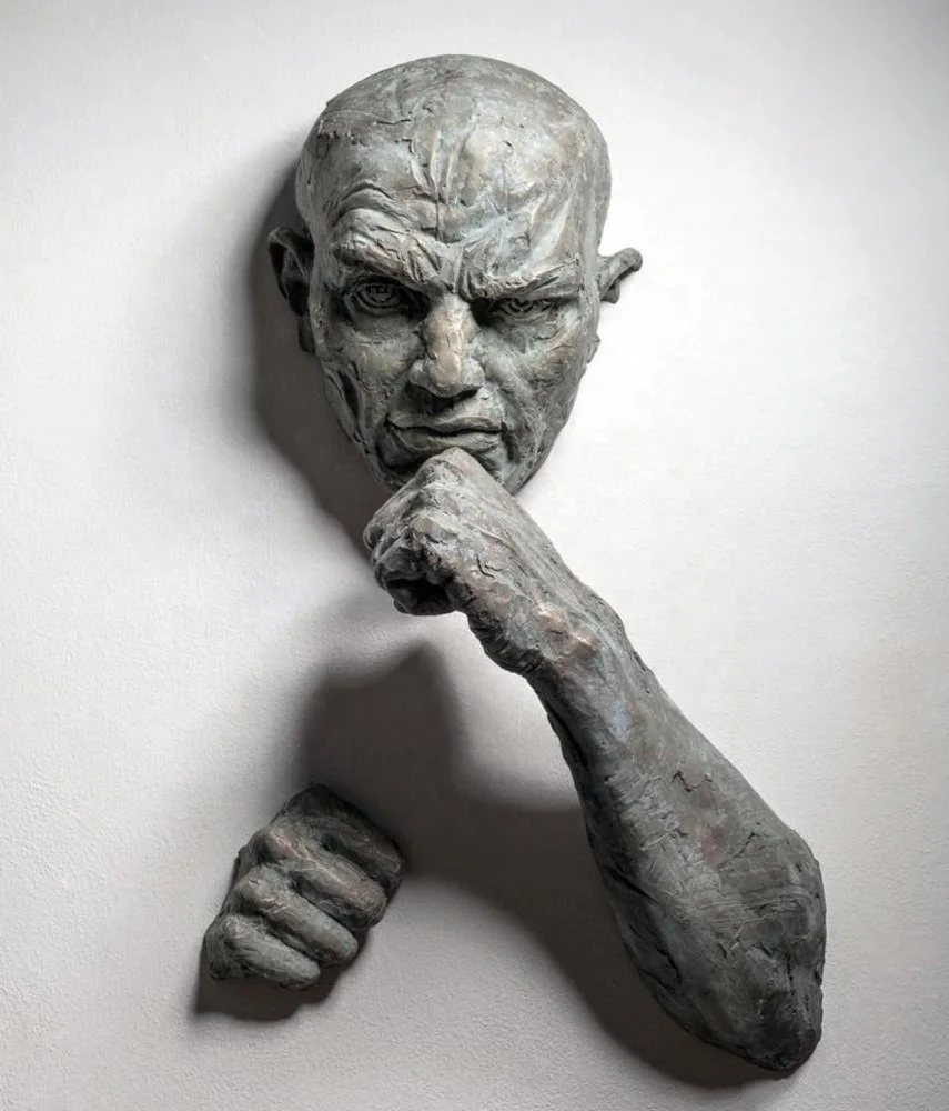 man wall art sculpture