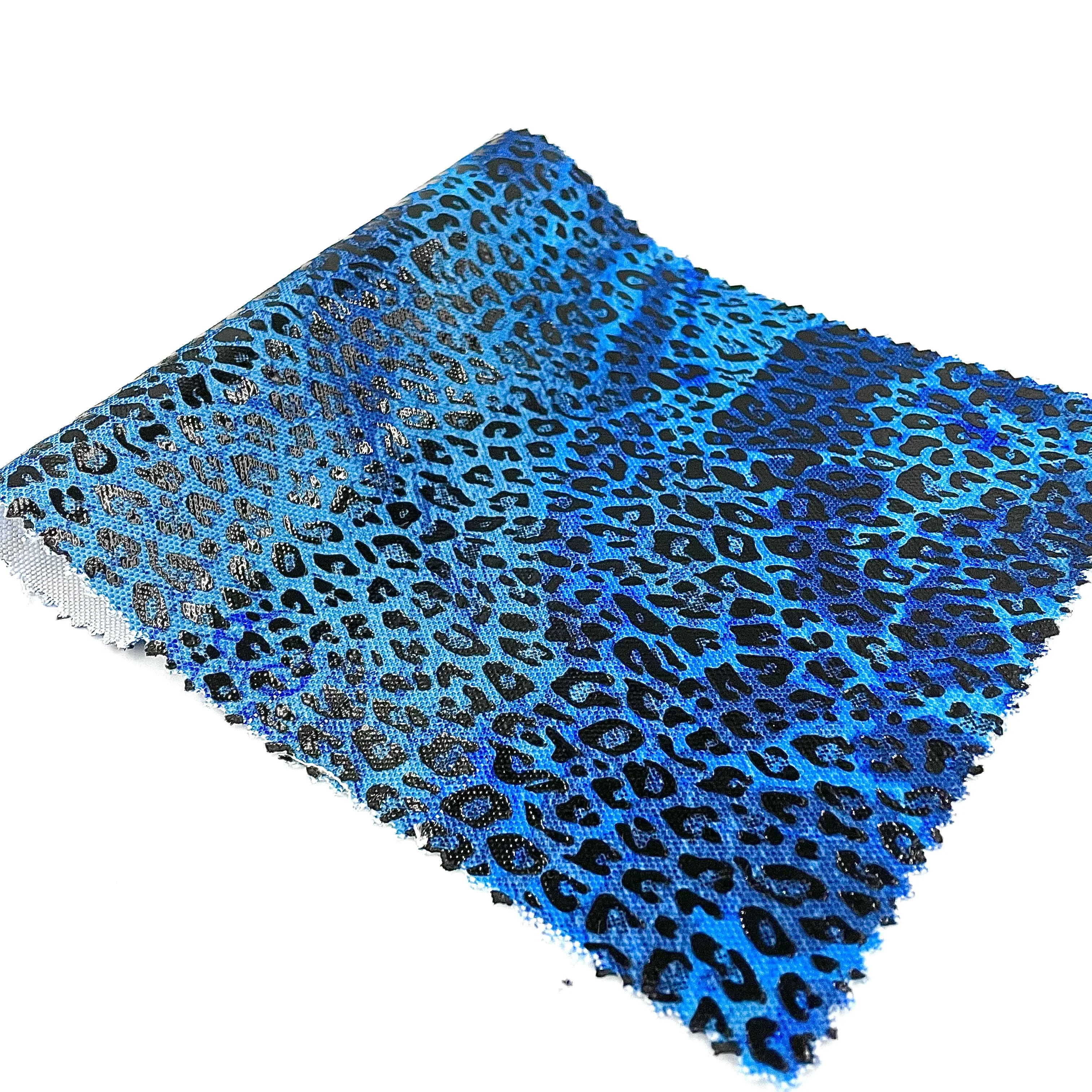 EPO High Quality 600D 100% Polyester with Glossy Laser Film Transferred Leopard Print for Luggage