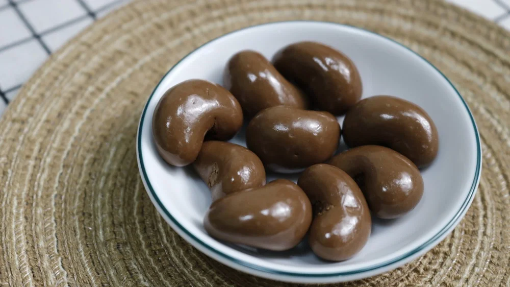 Milka chocolate sweets filled dried cashews for wholesale by Legendary Viet Nam chocolate bulk export