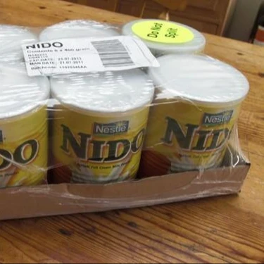 Сыпучий молочный порошок Nestle Nido 24x400