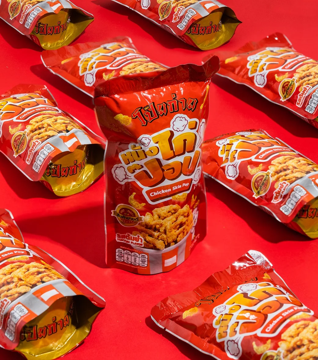 Poygai Crispy Fried Chicken Skin Pop Tom Yum Flavor 42 g. Premium Quality from Thailand for 100% Export Best Selling