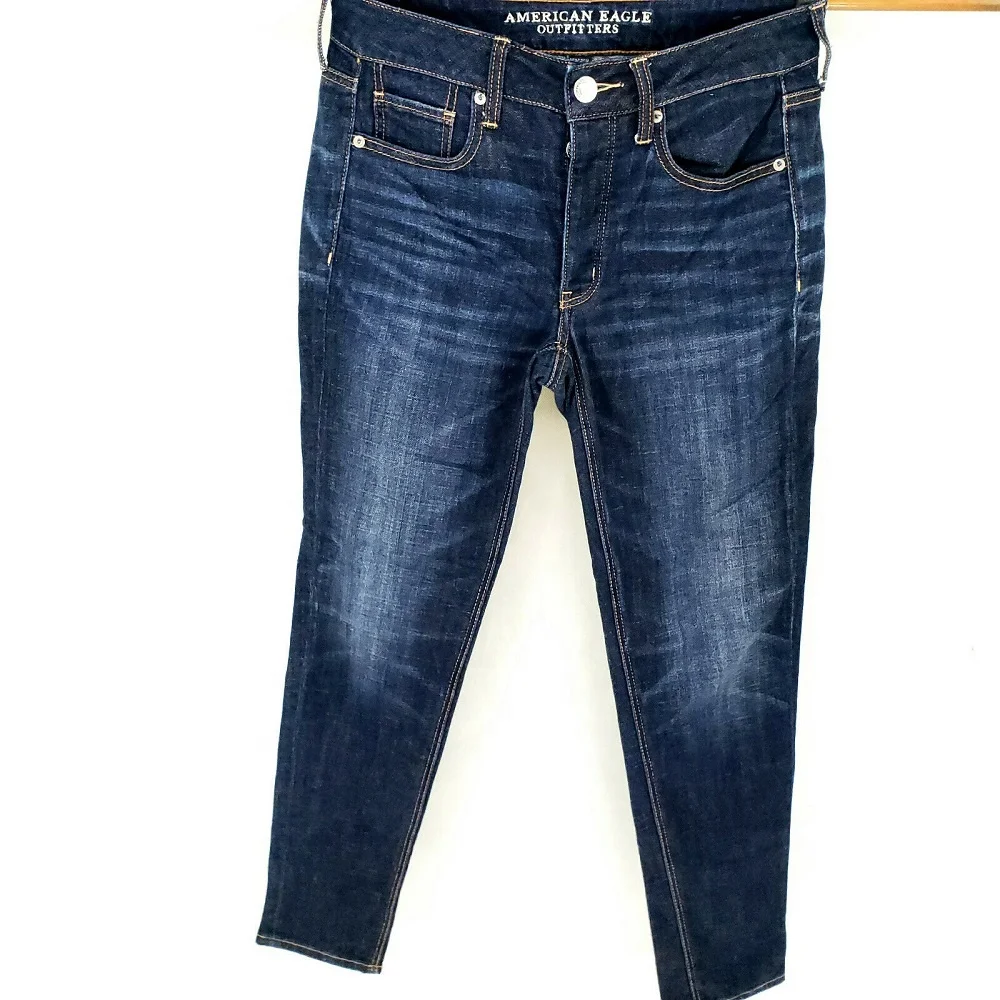 
 Джинсы повседневные голубые потертые джинсы с высокой талией из хлопка и полиэстера  