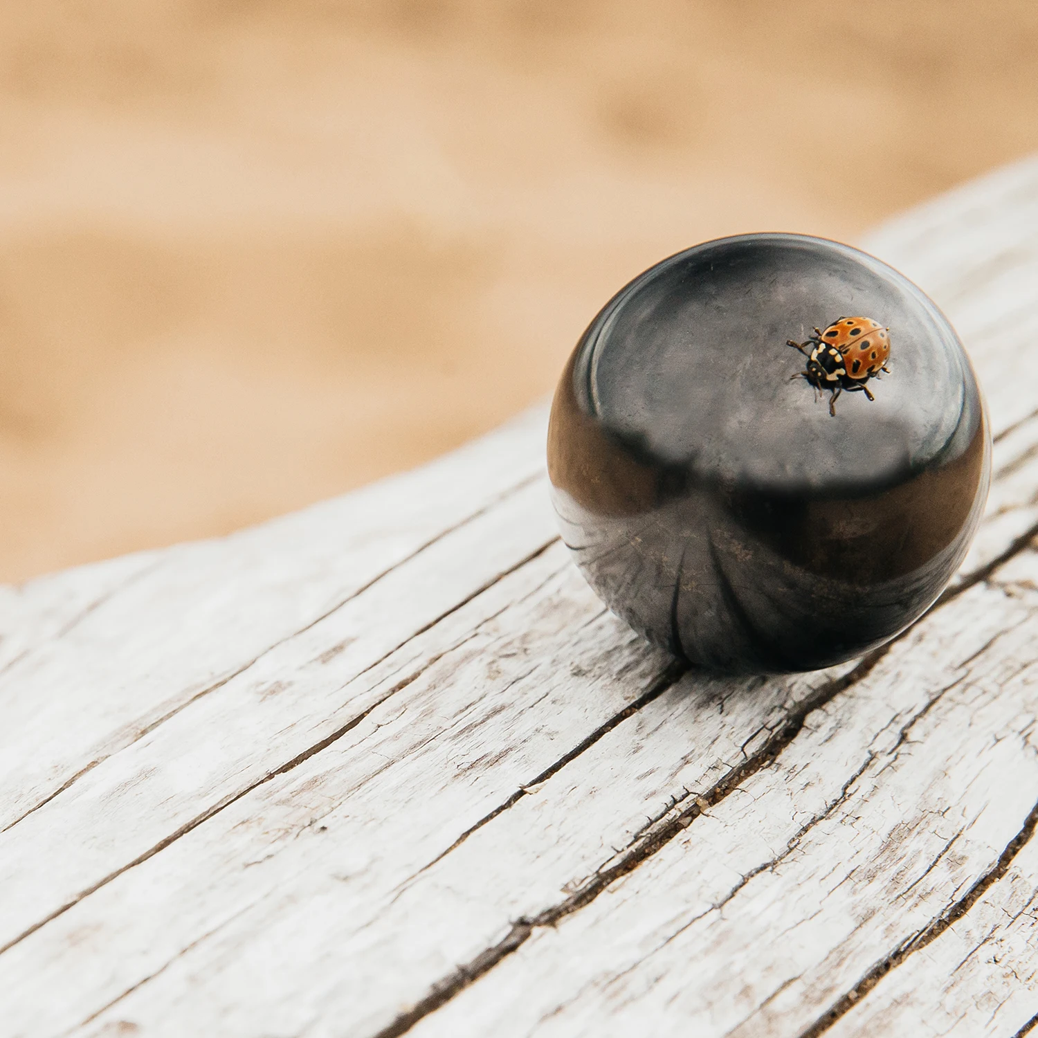 Shungite sphere with a diameter of 4 cm. Natural crystals from shungite. A crystal ball made of Russian shungite.