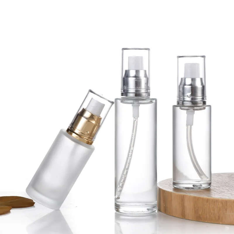 Wholesale 20ml 30ml 40ml 50ml 60ml 80ml 100ml Clear Frosted Glass Bottle With Sliver Gold Spray Lotion Pump