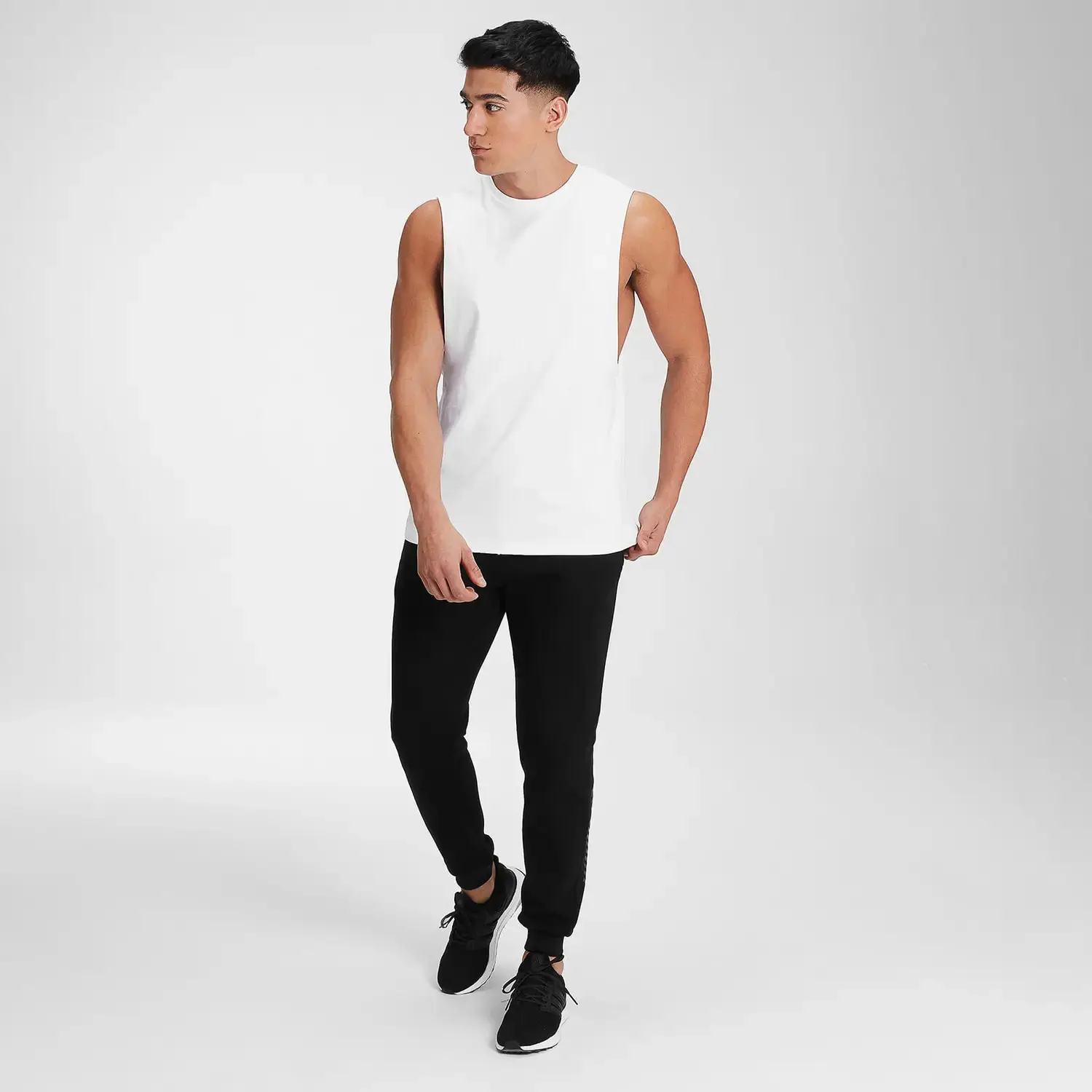  Пакистанское производство индивидуальный дизайн мужские майки без рукавов для тренажерного зала Майки Stringer