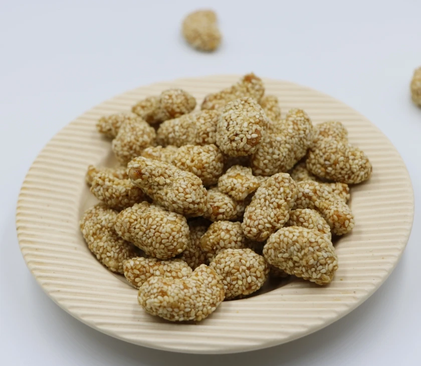 Premium White Sesame Coating Crispy Sweet Roasted Dried Cashew Nuts By Hola with COMMON Cultivation Type