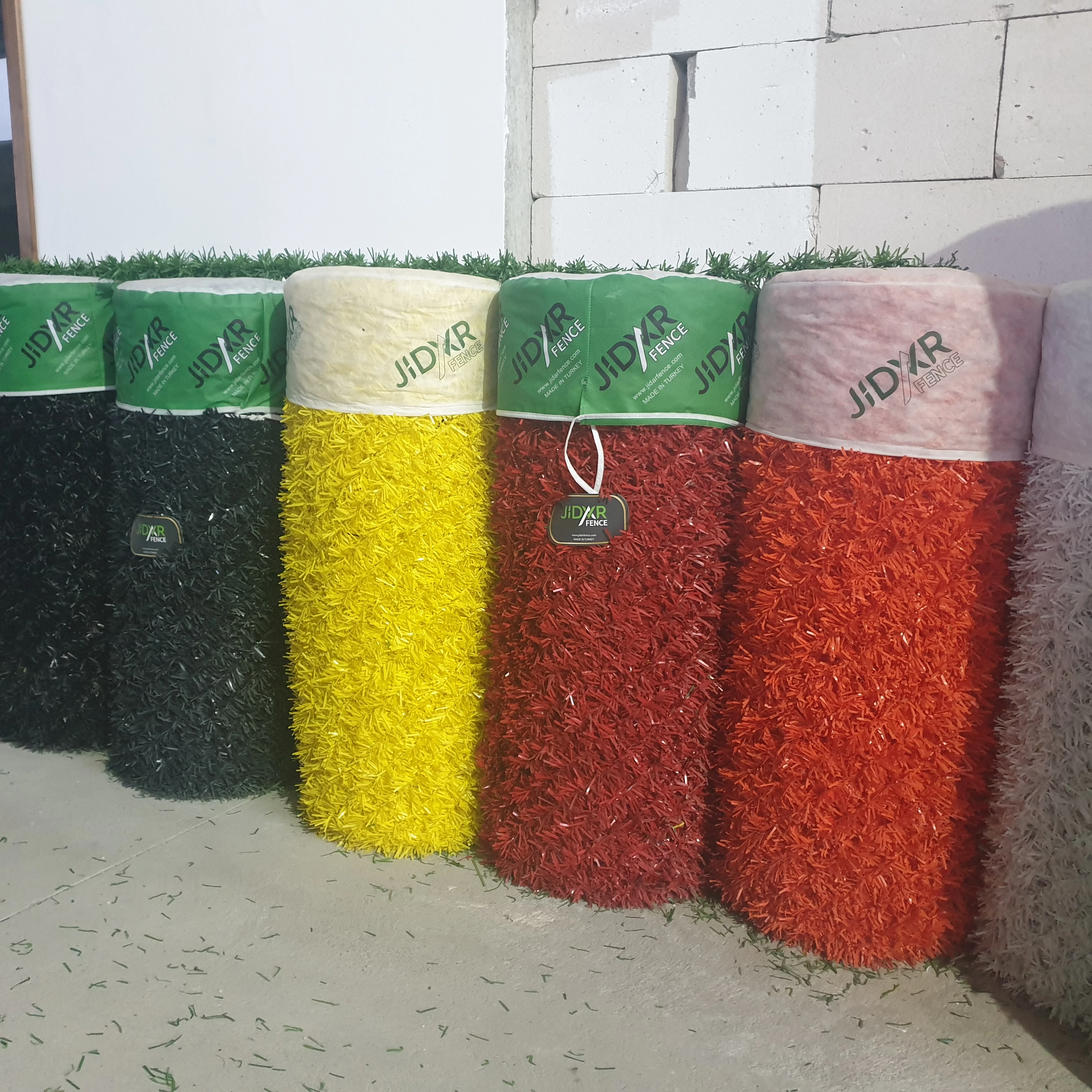 Red colour grass fence panels for gardens made from high quality pvc anti UV made in Turkey in different sizes and heights