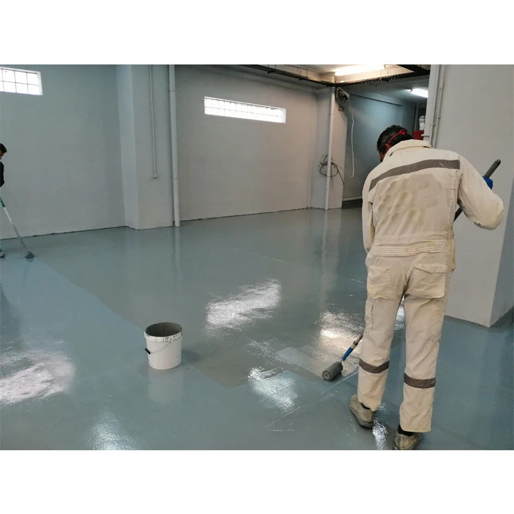 Green colored Epoxy Floor Coating Applied with A Roller - suitable for keeping warehouse clean and dust free